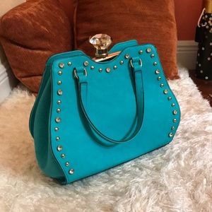 Turquoise purse w/ silver detailing